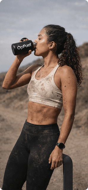 Athlete drinking OpFuel